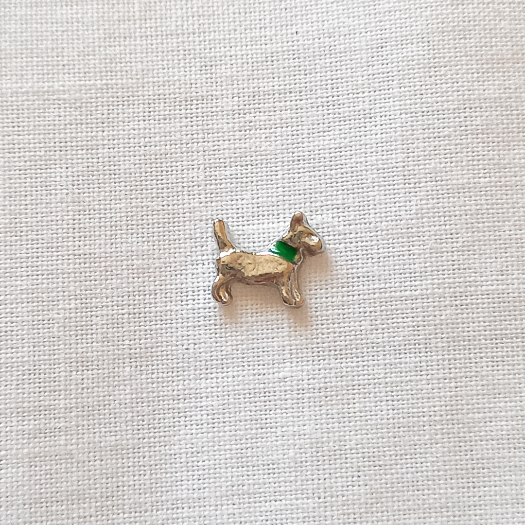 Small Dog With Green Collar Charm